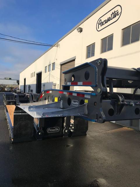Charcoal 75 ton lowbed with light blue pinstriping and its two axle nitrogen booster, photo 5 of 26
