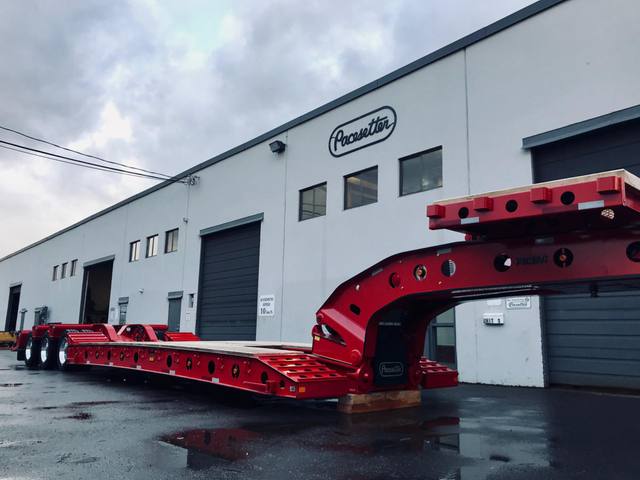 Red 75 ton lowbed with folding rear ramps at the Pacesetter yard, photo 5 of 12