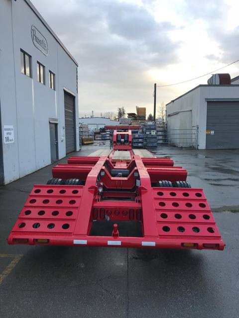 Red 75 ton lowbed with folding rear ramps at the Pacesetter yard, photo 8 of 12